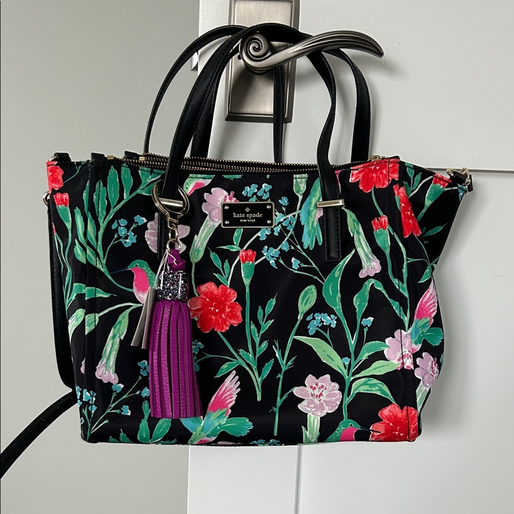 kate spade Black Floral Tote with Purple Tassel Charm